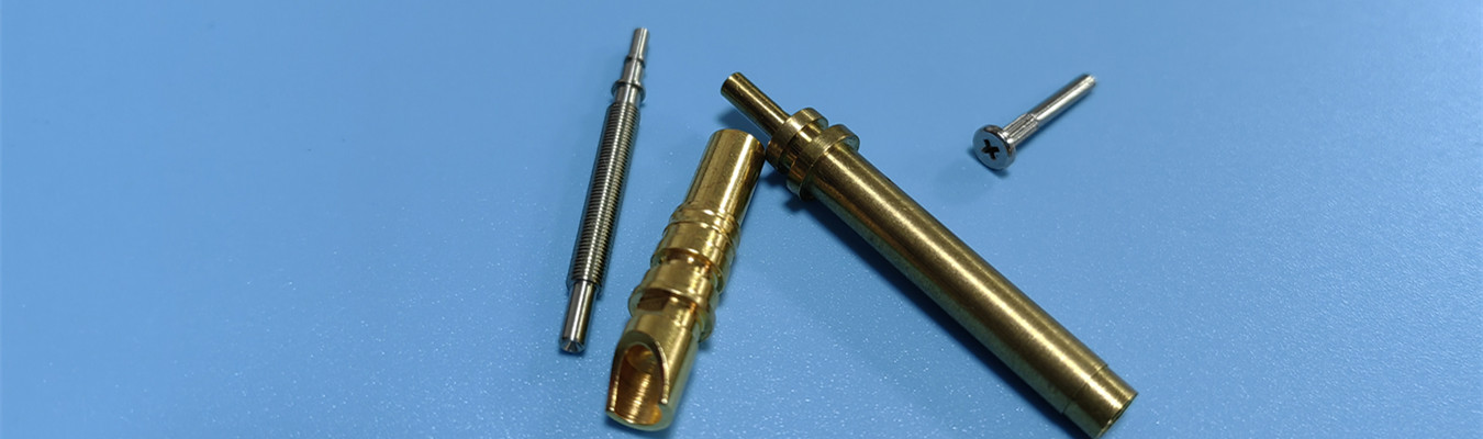 EV plug components manufactured using CNC Swiss machining for electric vehicle charging connector applications
