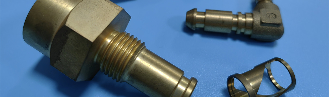 cnc machined brass fittings including elbow, tee, and coupling nuts